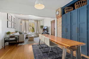 Office space with hardwood / wood-style floors