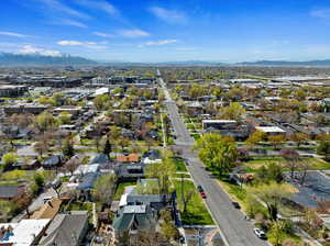 Birds eye view of property featuring a mountain view