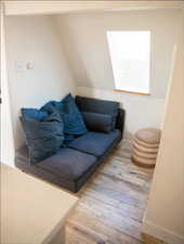 Living room with light wood-type flooring