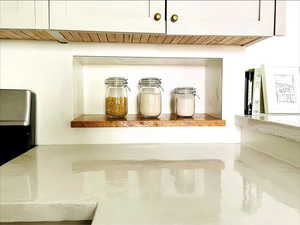 Interior details with wood ceiling and white cabinets