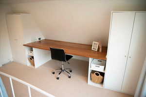 View of carpeted home office