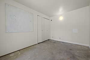 Unfurnished bedroom featuring a closet