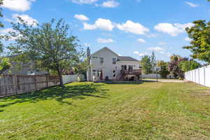 View of yard featuring a patio and a deck