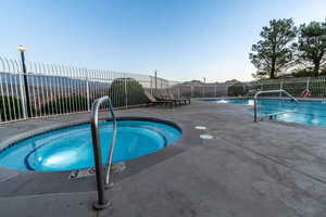 View of swimming pool with a patio area