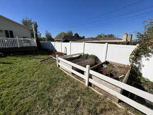 View of yard featuring a wooden deck