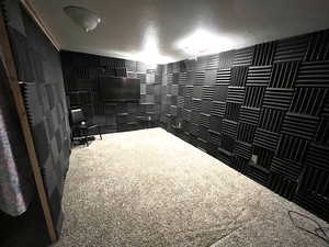 Recording studio with temporary wall, and soundproof wall coverings