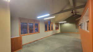 Office area with vaulted ceiling