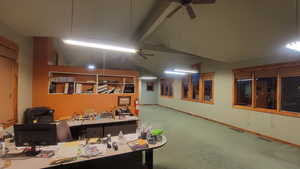 Office area featuring ceiling fan, and carpet flooring