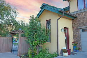 View of property exterior at dusk