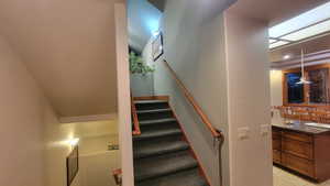 Stairway featuring tile patterned flooring