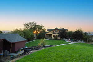 View of yard at dusk