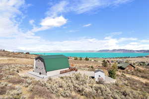 Property view of water with a mountain view