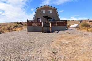 Exterior space with a wooden deck