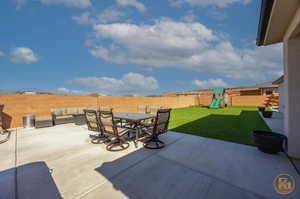 View of patio / terrace featuring a playground