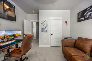 Office area with light colored carpet