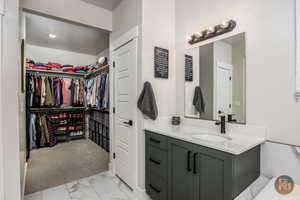 Bathroom with vanity and a textured ceiling