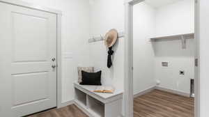 Mudroom with wood-type flooring