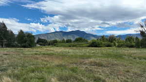 View of mountain feature with a rural view