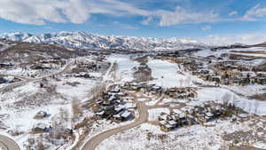 Snowy aerial view with a mountain view