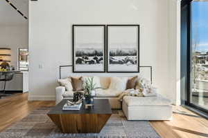 Living room with wood-type flooring