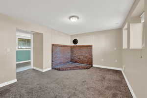 Unfurnished living room with carpet