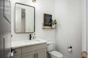 Bathroom with vanity and toilet