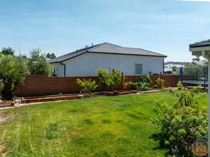 View of yard with a trampoline