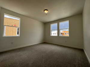 View of carpeted spare room