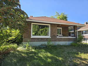 View of home's exterior featuring a lawn