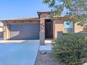 View of front of property featuring a garage