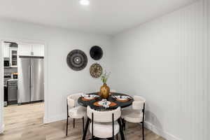 Dining room with light wood-type flooring