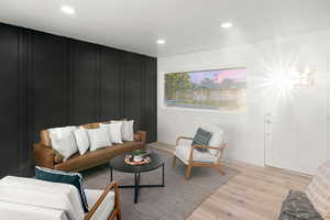 Living room featuring light hardwood / wood-style flooring