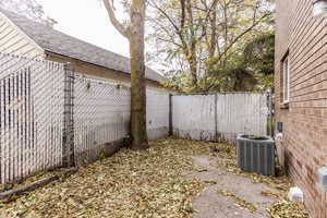 View of yard with cooling unit