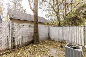 View of yard featuring central AC unit