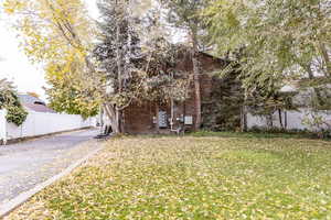 Exterior space with a front lawn