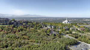 Birds eye view of property with a mountain view