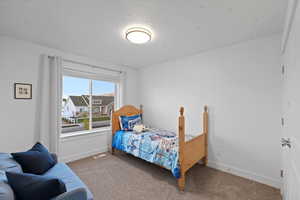 View of carpeted bedroom