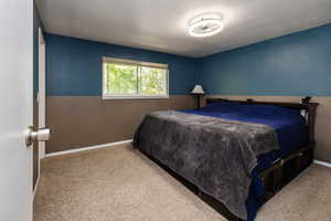 Bedroom with carpet flooring