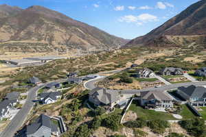 Birds eye view of property with a mountain view