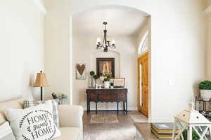 Interior space with a notable chandelier