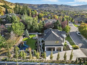 Birds eye view of property with a mountain view