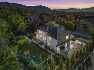 Aerial view at dusk featuring a mountain view