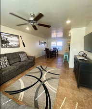 Tiled living room with ceiling fan