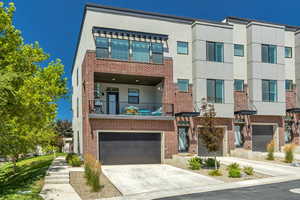 Beautiful end unit townhouse with double garage, large patio and private side door entry.