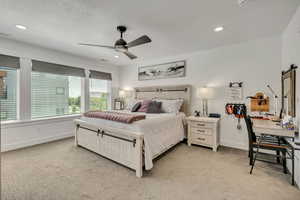 Primary suite with nook, walk-in closet and Roman black out shades.