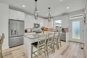 Kitchen with tray dividers, undercabinet lighting, roll-out drawers and upgraded finishes, just to name a few!