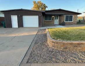 Single story home with a garage