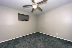 #2 Bedroom 2nd view - Gray Carpeted room with ceiling fan