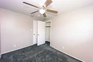 #3 Bedroom featuring ceiling fan, a closet, and dark Gray carpet