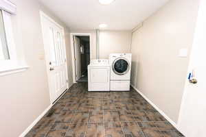 View 1 - Clothes washing area featuring independent washer and dryer  W & D included in the sale